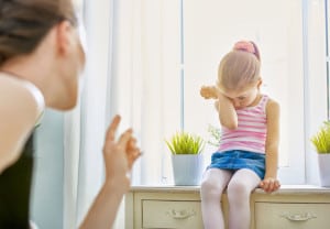 mother scolds her child